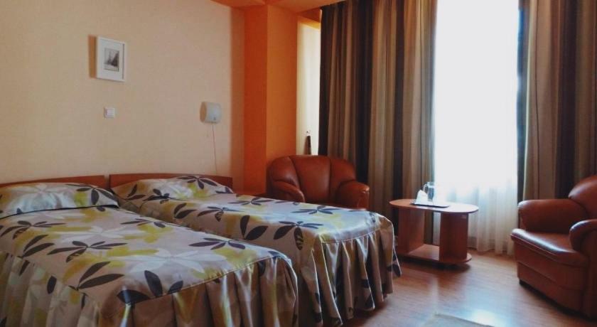 Postel nebo postele na pokoji v ubytování Hotel Express
