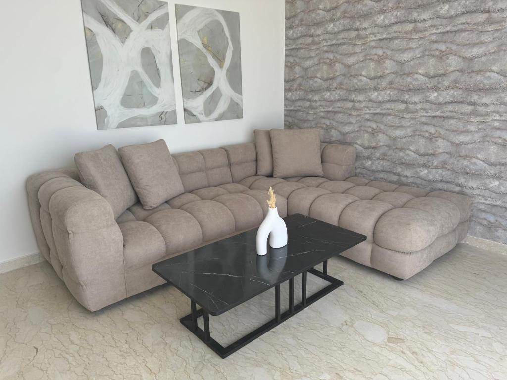 Khu vực ghế ngồi tại 38 Studio luxueux- Corniche à 5 min