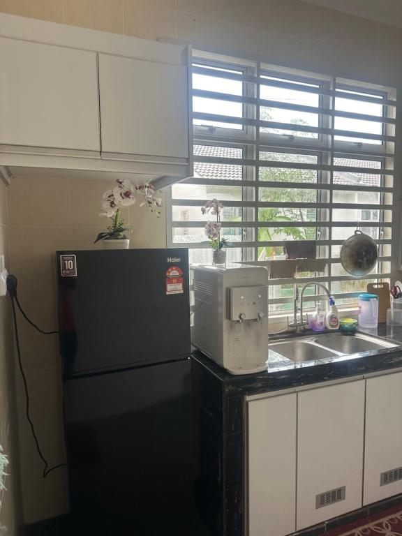 Kuchyň nebo kuchyňský kout v ubytování Ct tiara homestay