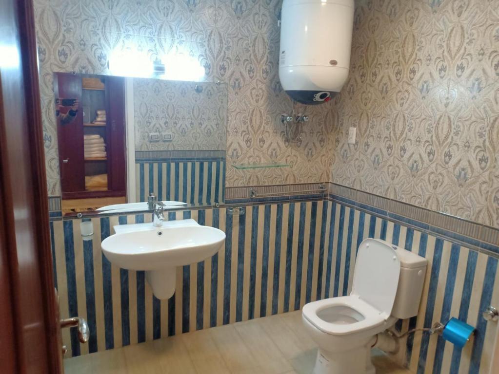 Koupelna v ubytování Amwaj Hotel