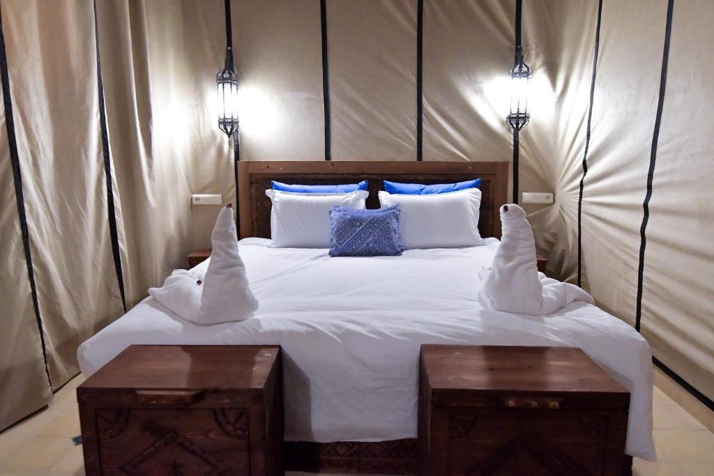 Postel nebo postele na pokoji v ubytování Dar Chams Ouarzazate