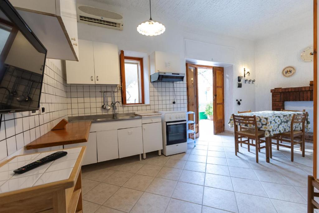 Kuchyň nebo kuchyňský kout v ubytování B&B Villa Passiaturo