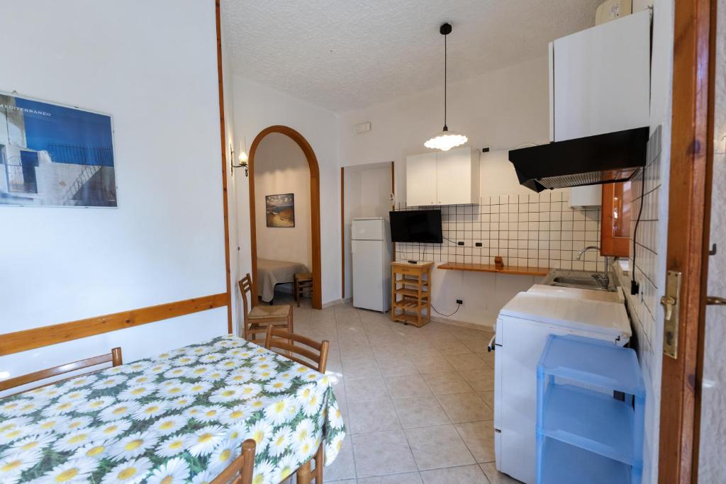 Kuchyň nebo kuchyňský kout v ubytování B&B Villa Passiaturo