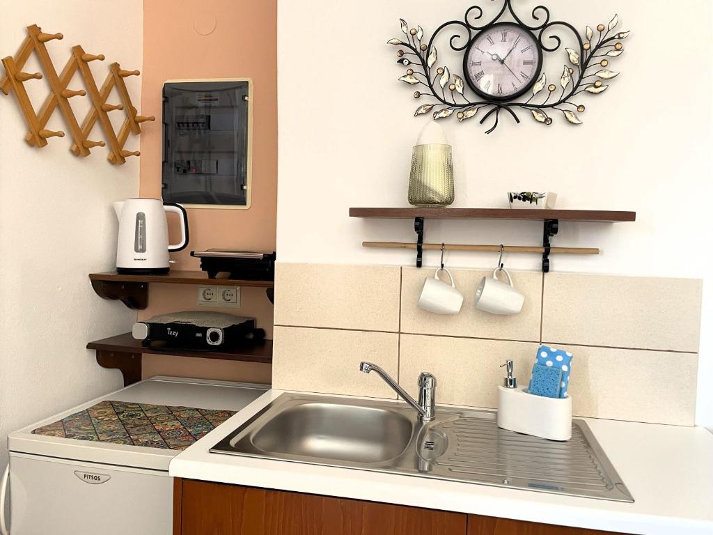 Kuchnia lub aneks kuchenny w obiekcie Nikelen Lindian Exclusive Apartments