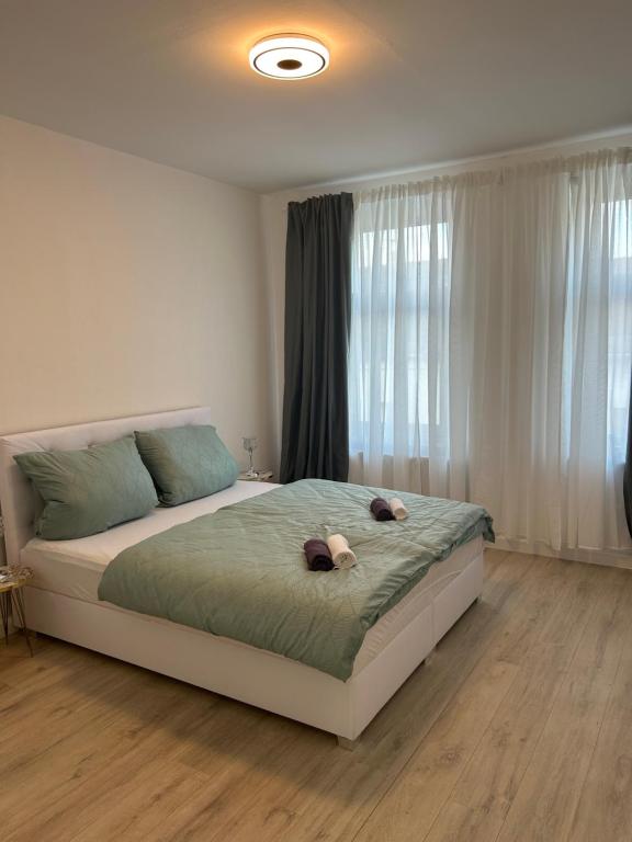 Ένα ή περισσότερα κρεβάτια σε δωμάτιο στο Apartment 3