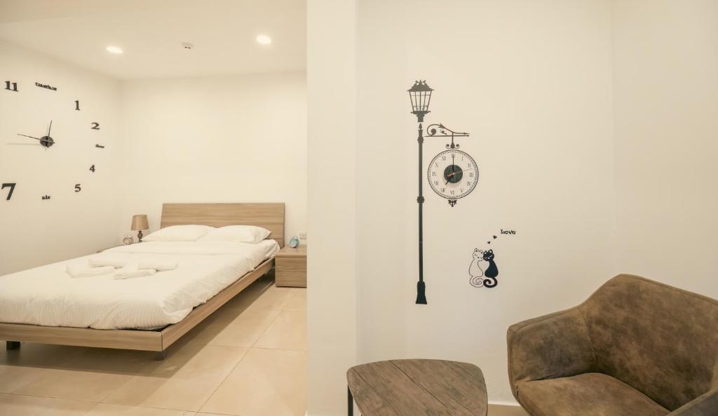 Postel nebo postele na pokoji v ubytování Sliema Central O'Clock Malta