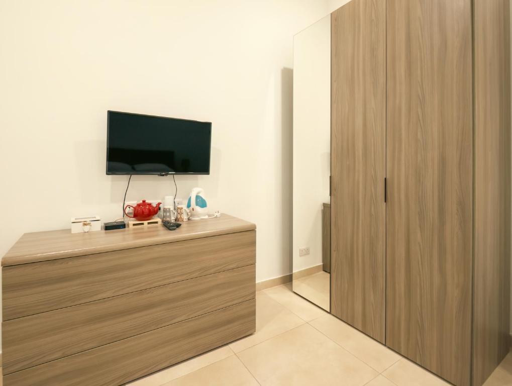 TV a/nebo společenská místnost v ubytování Sliema Central O'Clock Malta