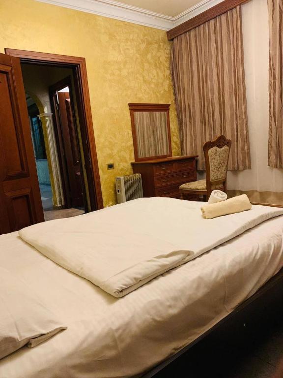 Postel nebo postele na pokoji v ubytování Hajime hotel-hostel