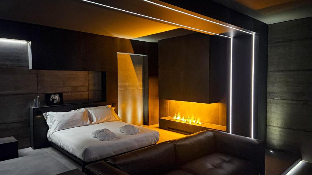 Postel nebo postele na pokoji v ubytování Agarthi Suites - Valtellina