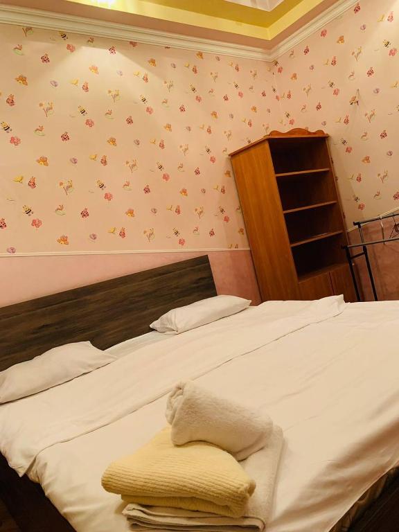 Postel nebo postele na pokoji v ubytování Hajime hotel-hostel