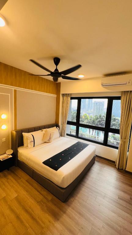 Postel nebo postele na pokoji v ubytování Agile TRX Luxury suite Bukit bintang