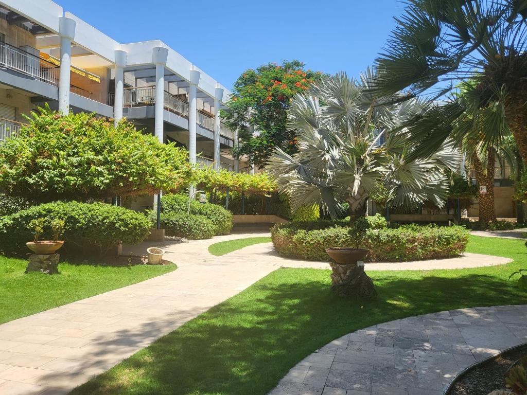 A garden outside oR-Ya Suite- Royal Park