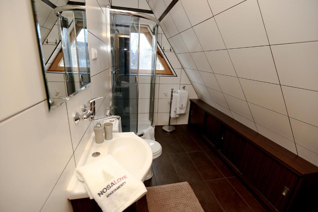 Kúpeľňa v ubytovaní Nosalove Apartamenty