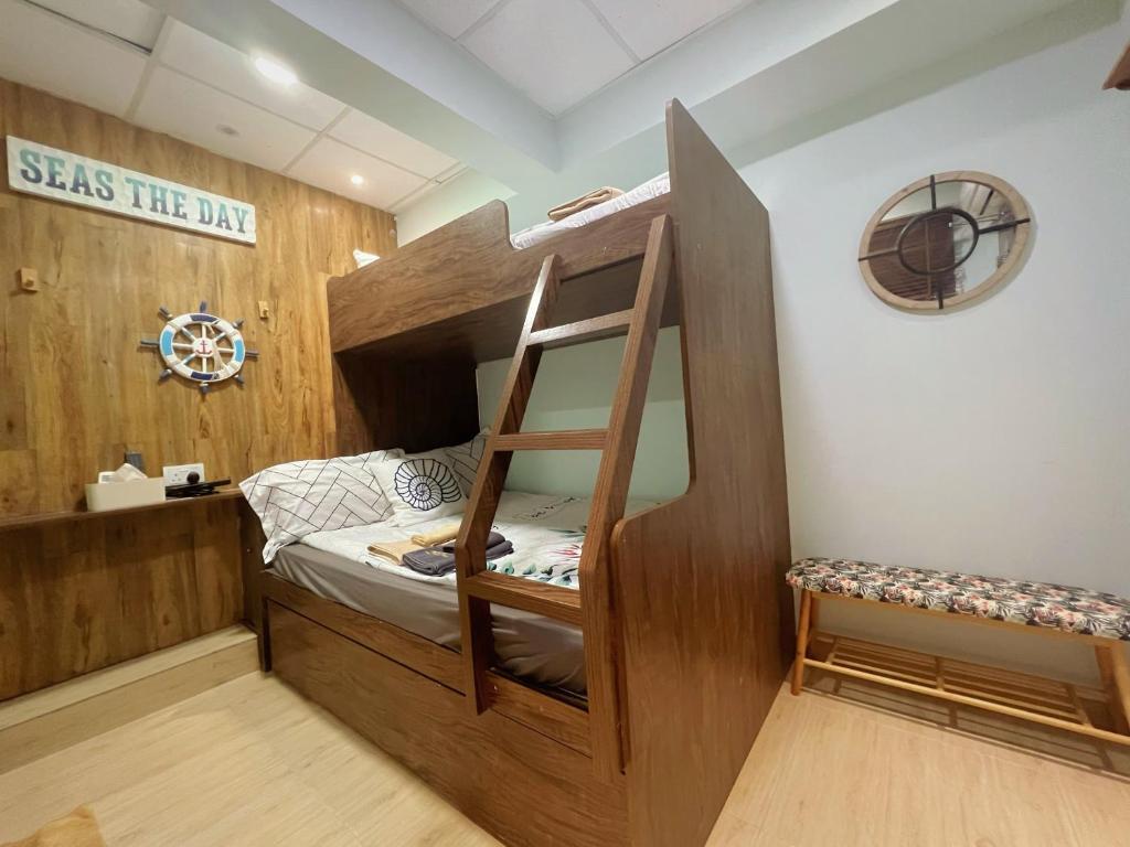 Postel nebo postele na pokoji v ubytování AMU Dreamhouse 阿木旅舍