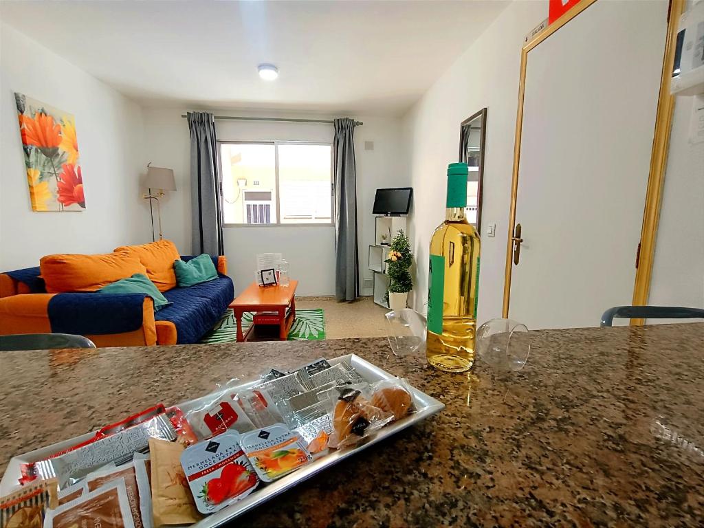 TV a/nebo společenská místnost v ubytování Apartamento RenTenerife Sand & Sea El Medano