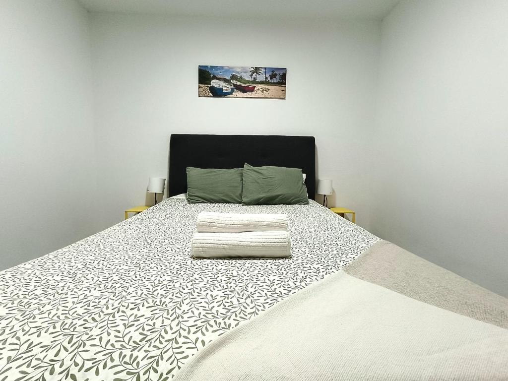 Postel nebo postele na pokoji v ubytování Apartamento RenTenerife Sand & Sea El Medano