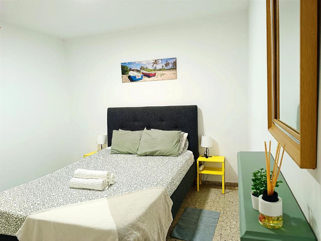 Postel nebo postele na pokoji v ubytování Apartamento RenTenerife Sand & Sea El Medano