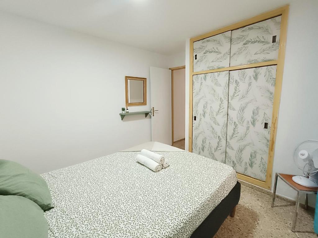 Postel nebo postele na pokoji v ubytování Apartamento RenTenerife Sand & Sea El Medano