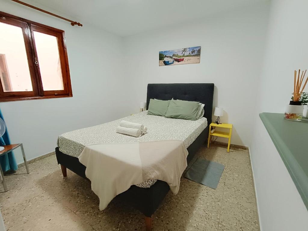 Postel nebo postele na pokoji v ubytování Apartamento RenTenerife Sand & Sea El Medano