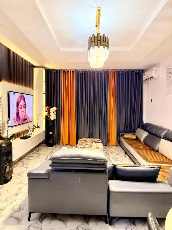 TV a/nebo společenská místnost v ubytování Mercy Apartment