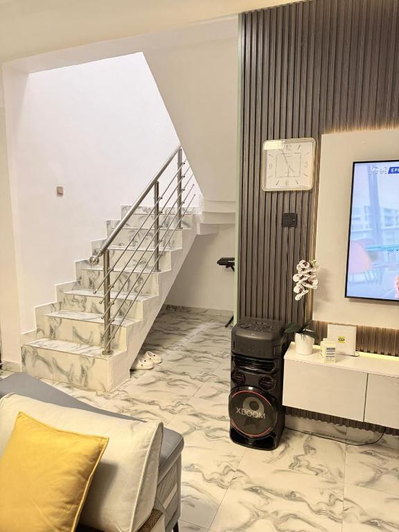 TV a/nebo společenská místnost v ubytování Mercy Apartment