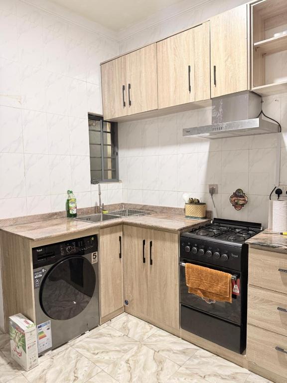 Kuchyň nebo kuchyňský kout v ubytování Mercy Apartment
