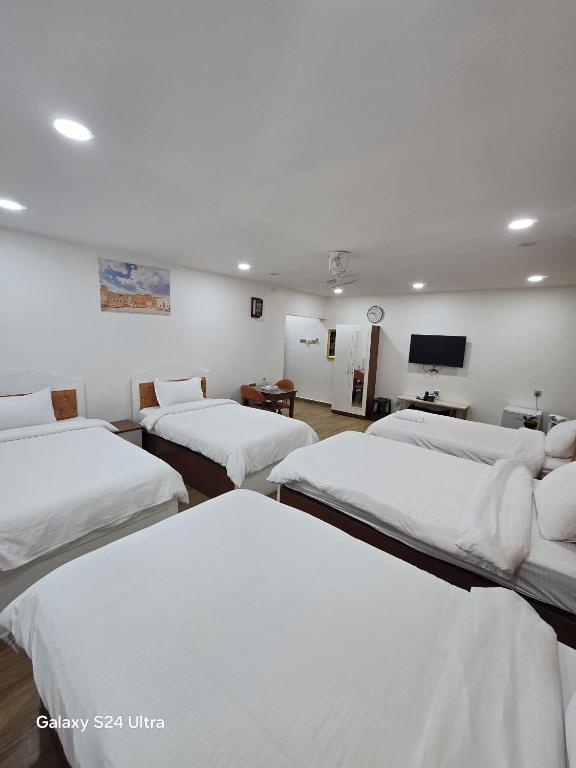 Postel nebo postele na pokoji v ubytování Dar Al Salaam Hospitality House