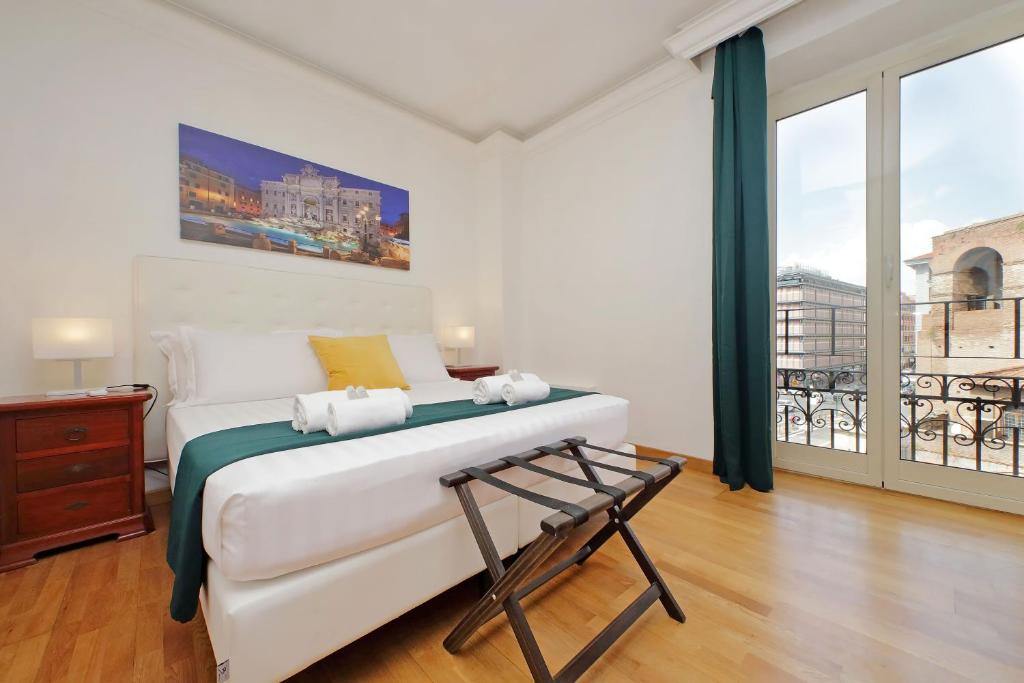 Postel nebo postele na pokoji v ubytování Romulus Rooms