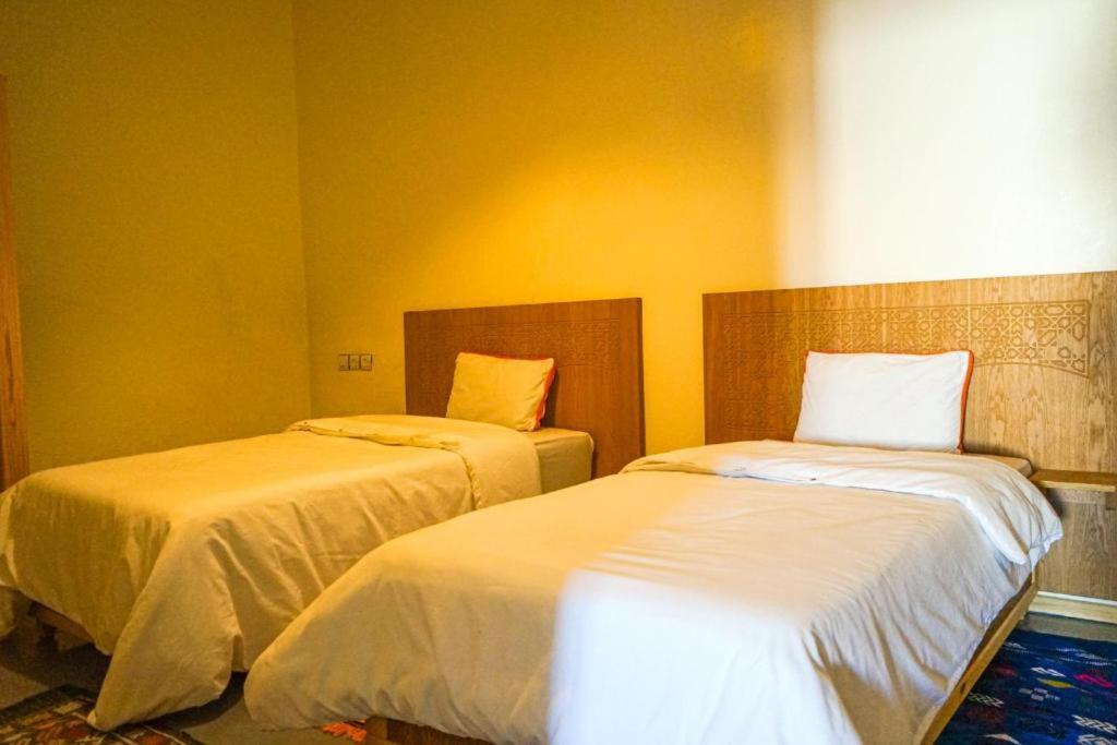 Letto o letti in una camera di Mir Dunes&Waves Camp