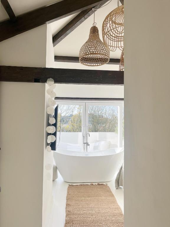 Ein Badezimmer in der Unterkunft Het sfeerhuis aan zee