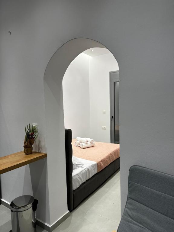 Postel nebo postele na pokoji v ubytování MMs house at Mikrolimano
