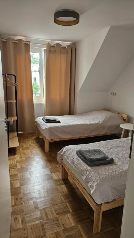 Postel nebo postele na pokoji v ubytování Modern Penthouse APT2 near Frankfurt