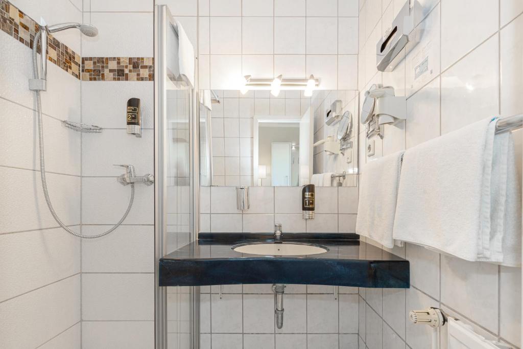 Koupelna v ubytování Hotel Klaus Störtebeker