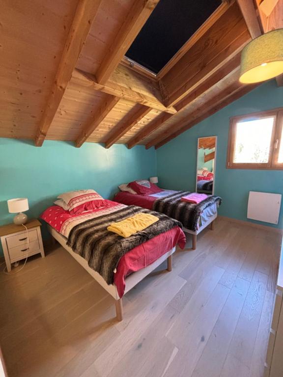 Postel nebo postele na pokoji v ubytování Chalet le Lotus Blanc