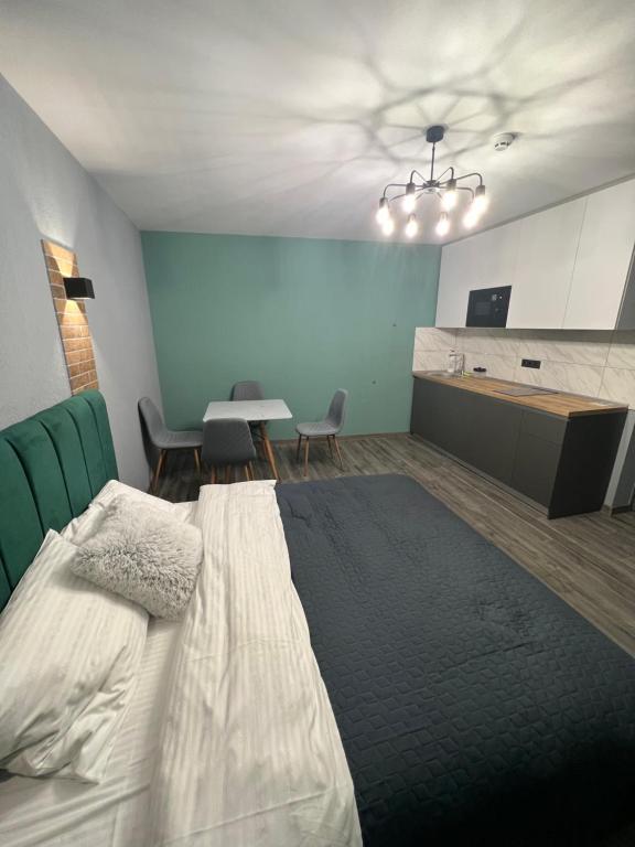 Postel nebo postele na pokoji v ubytování Hotel Menchul