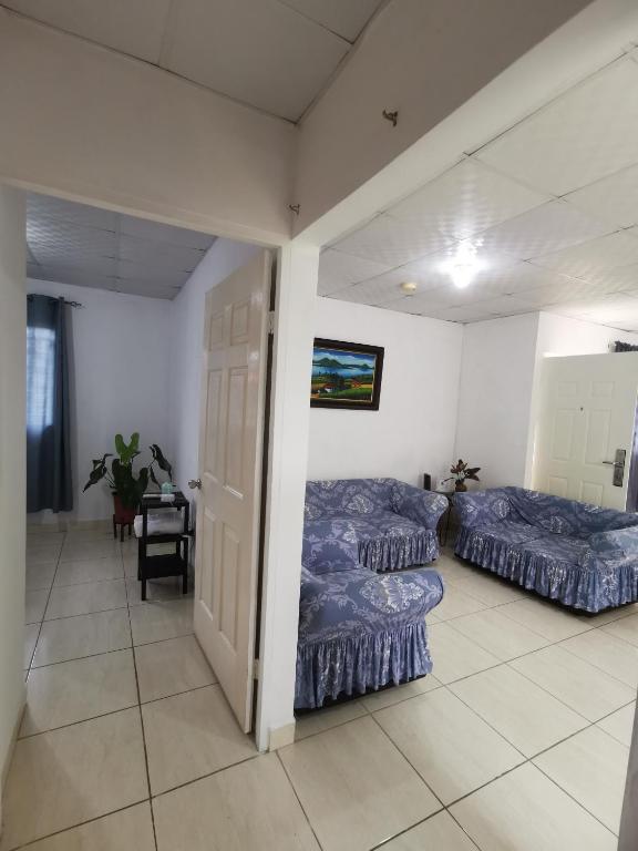Postel nebo postele na pokoji v ubytování Copey house Chiriquí, vía hacia Volcán