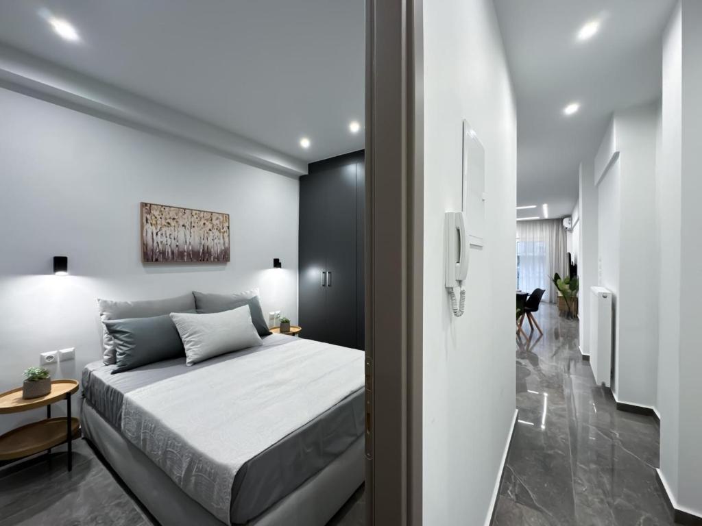 Postel nebo postele na pokoji v ubytování Luxurious Residence Thessaloniki