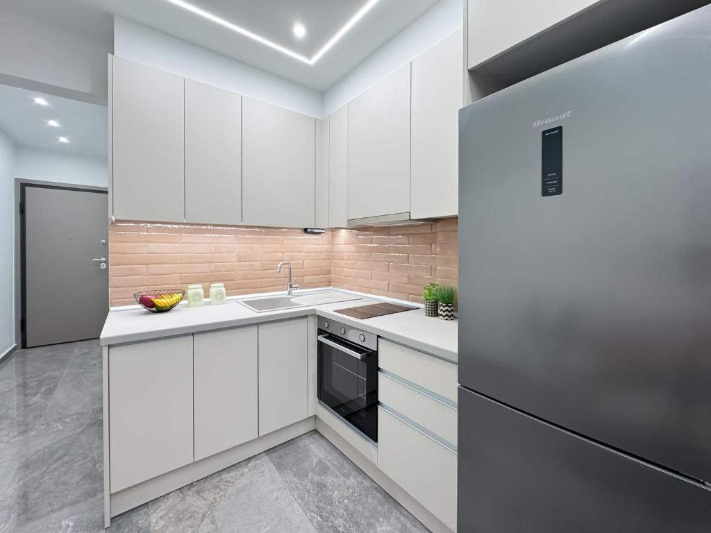Kuchyň nebo kuchyňský kout v ubytování Luxurious Residence Thessaloniki