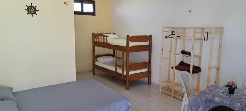 Suítes Privativas à 100m da Praia "NÃO É CASA INTEIRA"