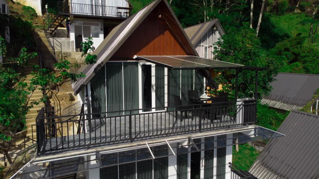 an overhead view of a house with a balcony at Alankara St Clair Retreat Talawakelle in Talawakele