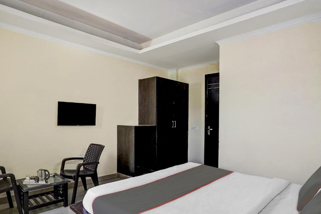 TV a/nebo společenská místnost v ubytování Hotel O Gurgaon 26