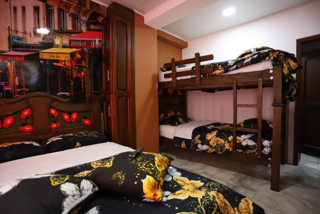 Postel nebo postele na pokoji v ubytování Hôtel d’lyon