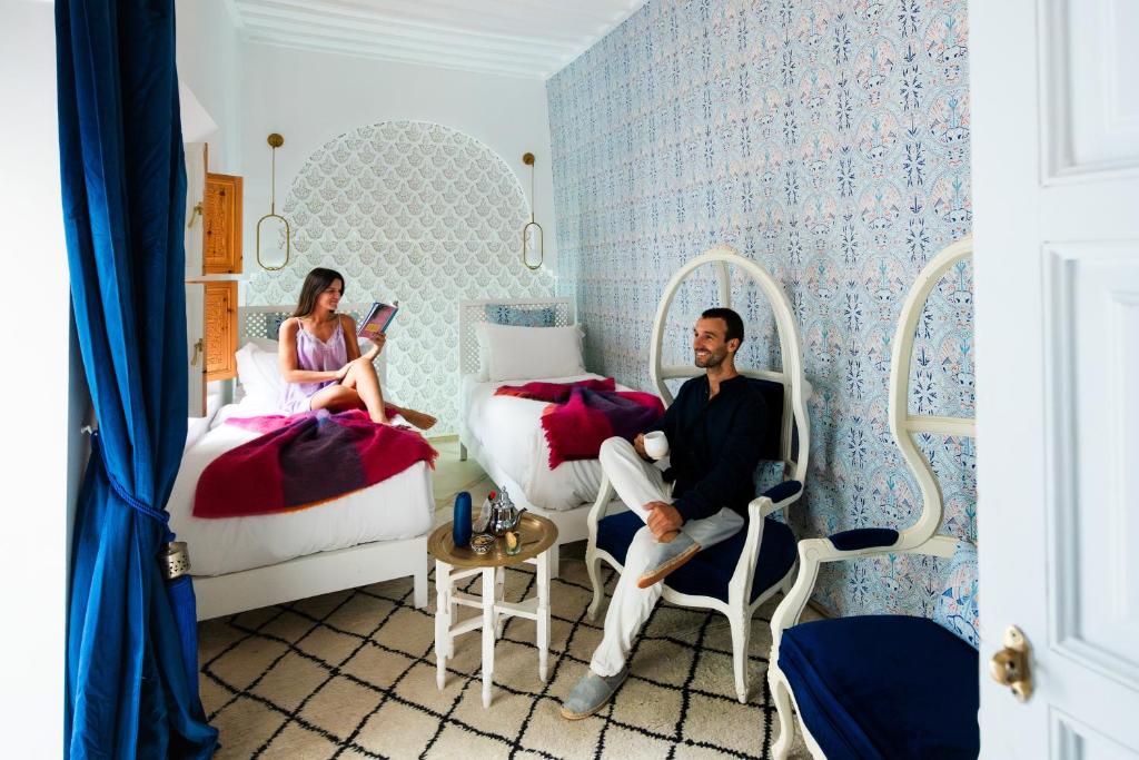 Postel nebo postele na pokoji v ubytování Riad Botanica