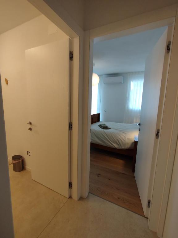 Postel nebo postele na pokoji v ubytování Agriturismo Casa Bregalda