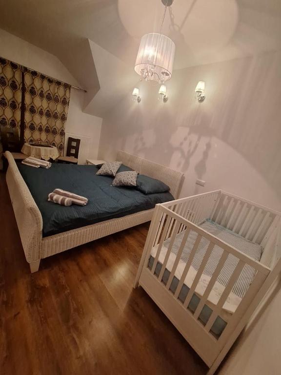 Postel nebo postele na pokoji v ubytování Villa Varzob