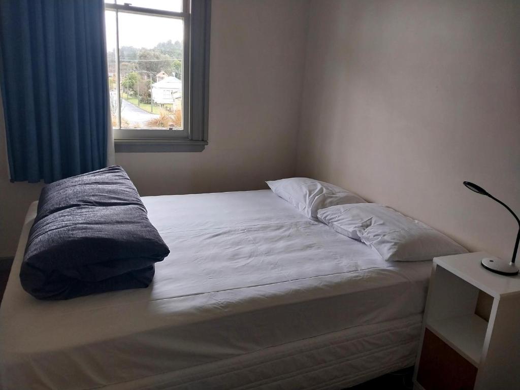 Postel nebo postele na pokoji v ubytování Station Lodge