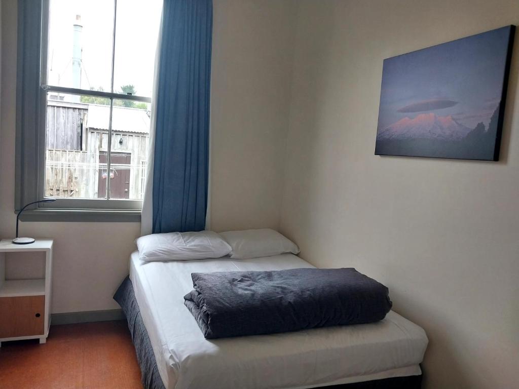 Postel nebo postele na pokoji v ubytování Station Lodge