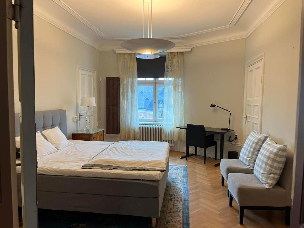 Ένα ή περισσότερα κρεβάτια σε δωμάτιο στο White Star Uppsala City