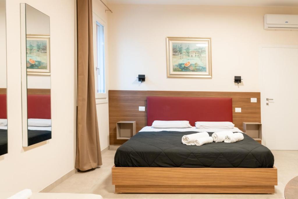 Postel nebo postele na pokoji v ubytování Villa Eliseo