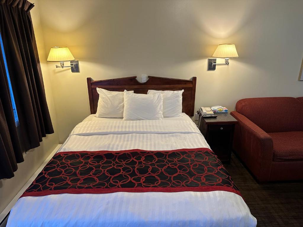 Postel nebo postele na pokoji v ubytování Kings Motor Inn